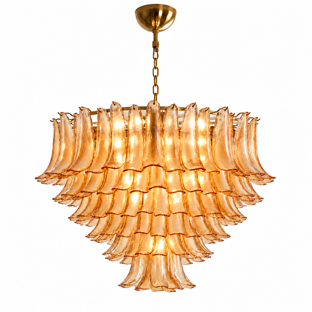 A tiered chandelier featuring multiple layers of fluted, ruffled amber glass shades, suspended from a matching gold-toned chain and ceiling canopy against a plain white background.
