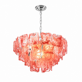 A modern multi-light pendant chandelier featuring textured, overlapping translucent coral-pink glass shades suspended from a polished silver-tone chain and ceiling canopy.