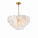 A modern multi-light chandelier featuring clear, irregularly shaped ice-like glass blocks suspended in a tiered circular arrangement, with a polished gold brass chain and ceiling canopy, shown against a solid white background.