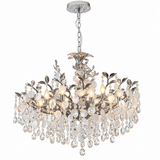 A multi-light crystal chandelier with a silver-tone metal frame featuring leaf and vine details, clear faceted crystal drops, and frosted round crystal accents, shown against a plain white background.