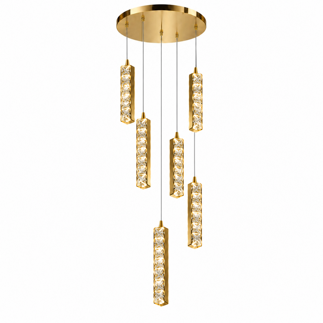 A modern multi-light linear chandelier with a gold circular ceiling canopy and five cascading cylindrical crystal-encrusted light tubes on a solid white background.