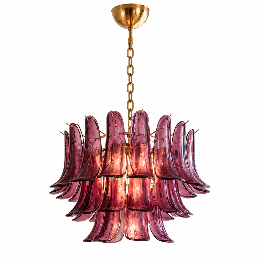 A modern chandelier featuring multiple curved, petal-like burgundy glass shades suspended from a gold-toned brass chain and ceiling canopy, shown against a solid white background.