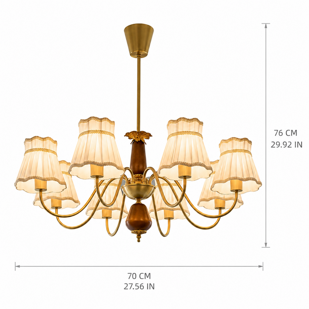 A brass nine-light chandelier with cream-colored pleated drum shades, shown with dimension lines indicating a width of 70 cm (27.56 in) and a height of 76 cm (29.