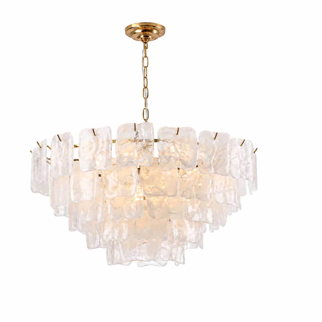 A modern tiered chandelier featuring textured, irregular clear glass shades suspended from a brushed gold metal frame and chain, shown against a solid white background.