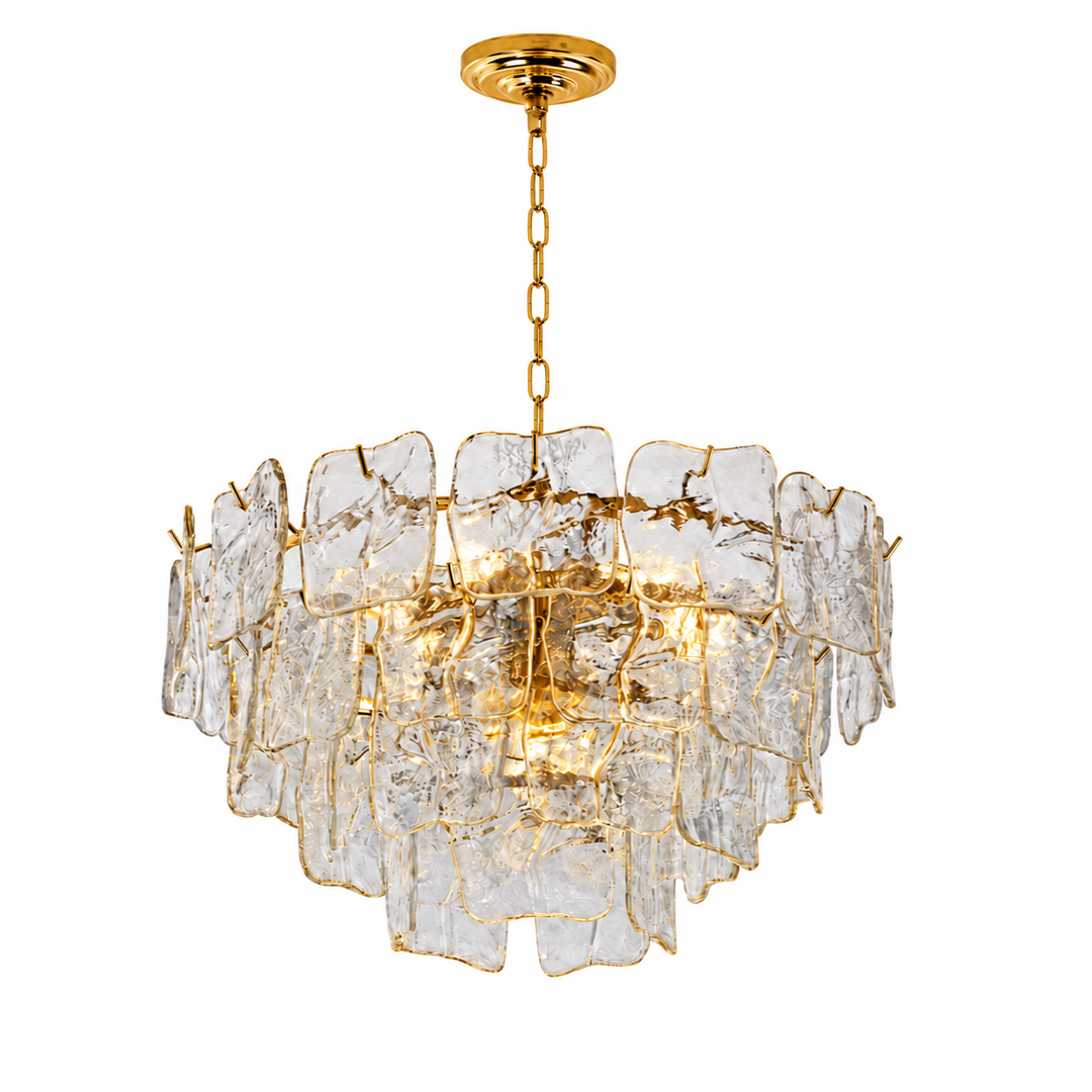 A modern multi-light chandelier featuring clear, irregularly shaped glass panels held together by gold-toned metal framing, suspended from a gold canopy and chain against a plain white background.