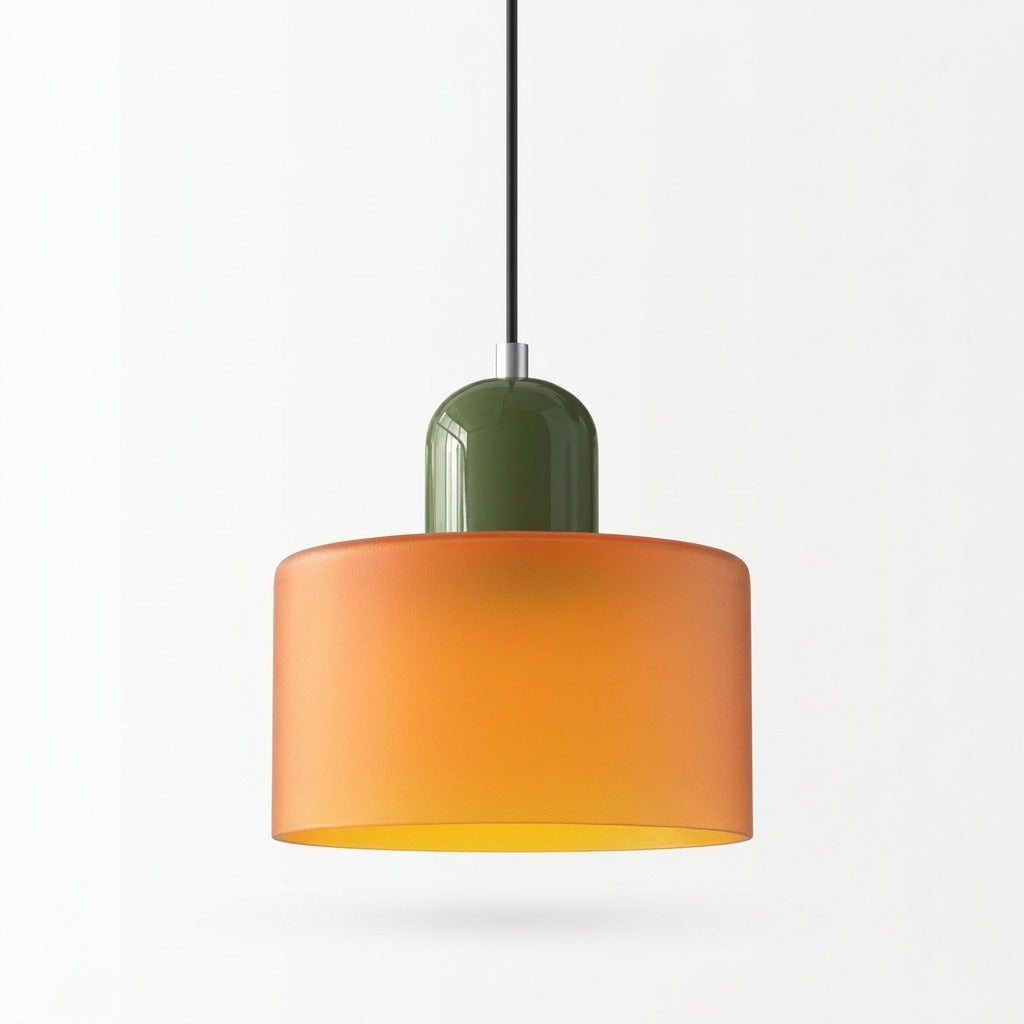 An orange glass chandelier with an olive green rounded top hangs from a black cord against a white background.