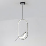 A modern pendant light fixture with a polished chrome oval frame and a sculptural bird-shaped shade, suspended by a thin cord from a black ceiling canopy against a plain white ceiling.