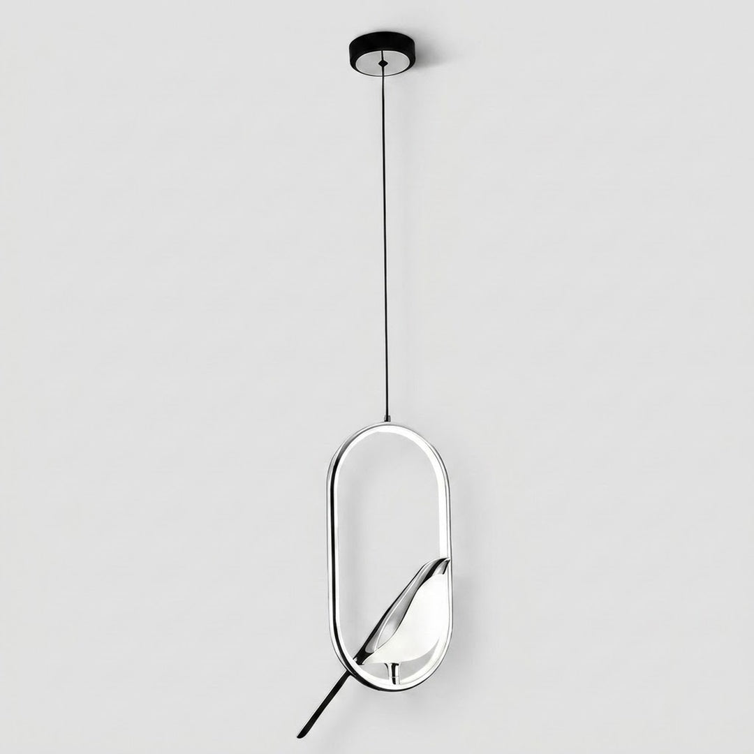 A modern pendant light fixture with a thin black suspension cord, a circular black ceiling canopy, and a polished silver-toned oval frame holding a white leaf-shaped glass shade, shown against a light gray background.