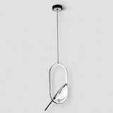 A modern pendant light fixture with a thin black suspension cord, a circular black ceiling canopy, and a polished silver-toned oval frame holding a white leaf-shaped glass shade, shown against a light gray background.