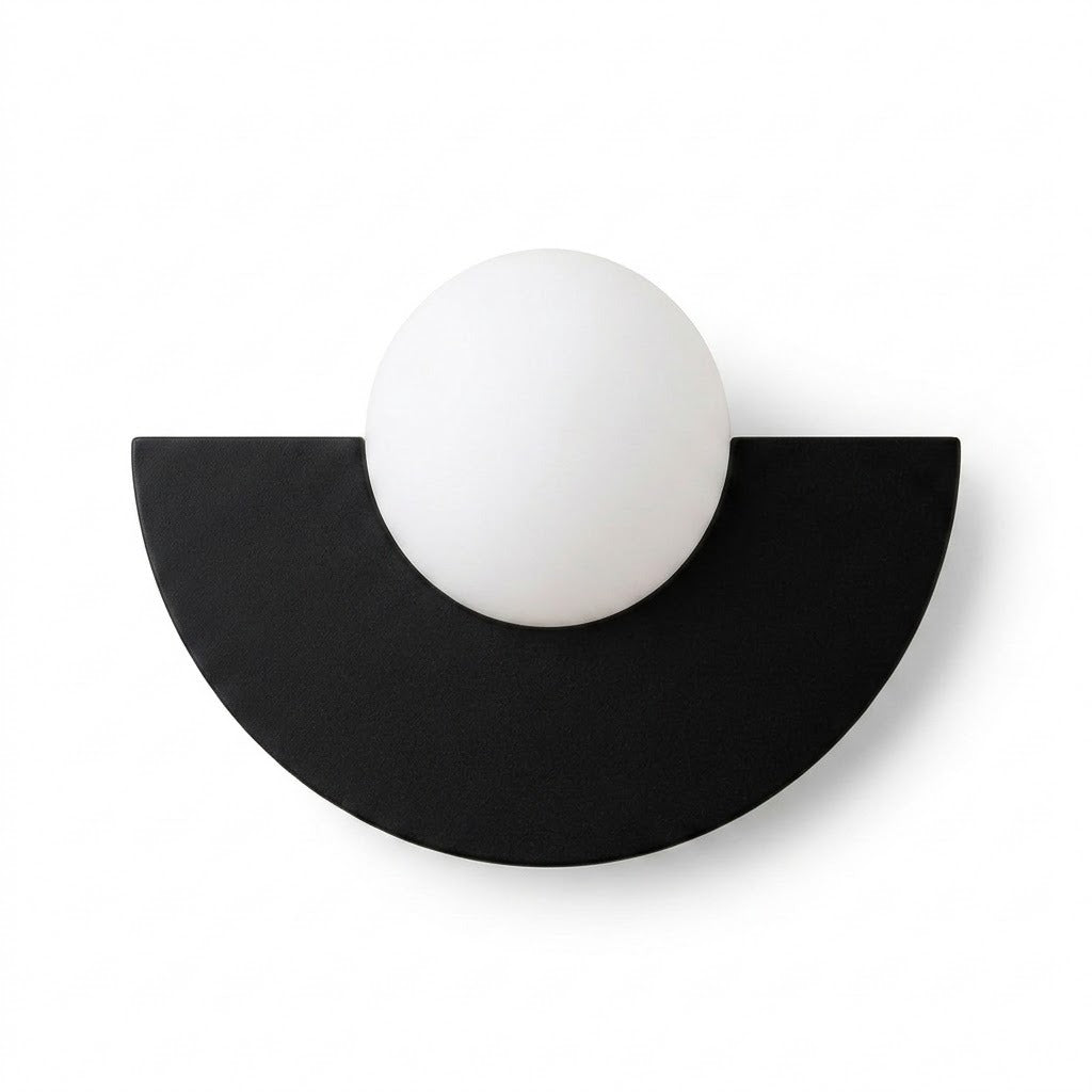 Black wall sconce with a semicircular body and white globe shade, shown from the front against a white background.