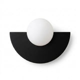 Black wall sconce with a semicircular body and white globe shade, shown from the front against a white background.