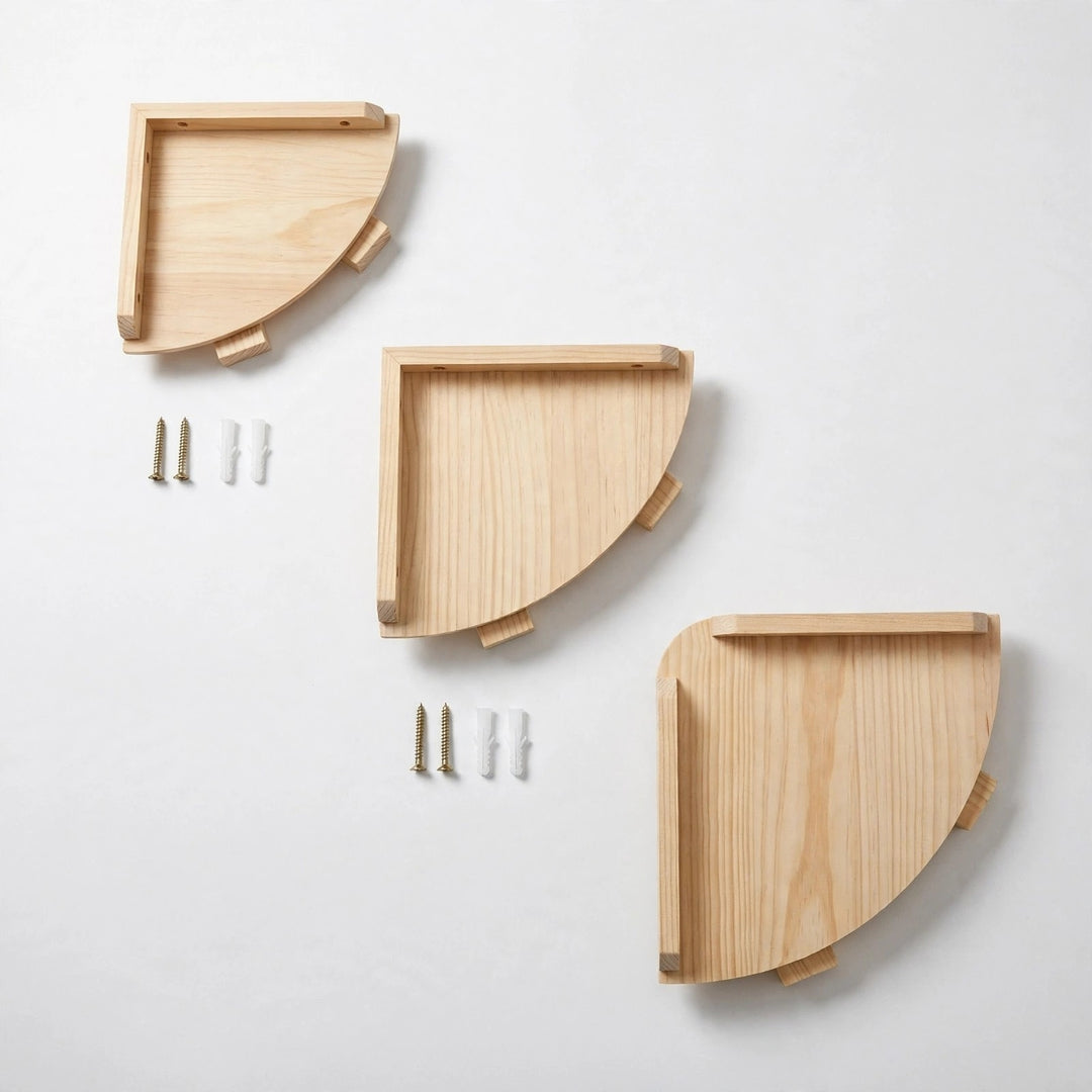 Three natural pine quarter-round corner shelves in increasing sizes on a white background, with small blocks beneath curved edges and hardware beside two shelves.