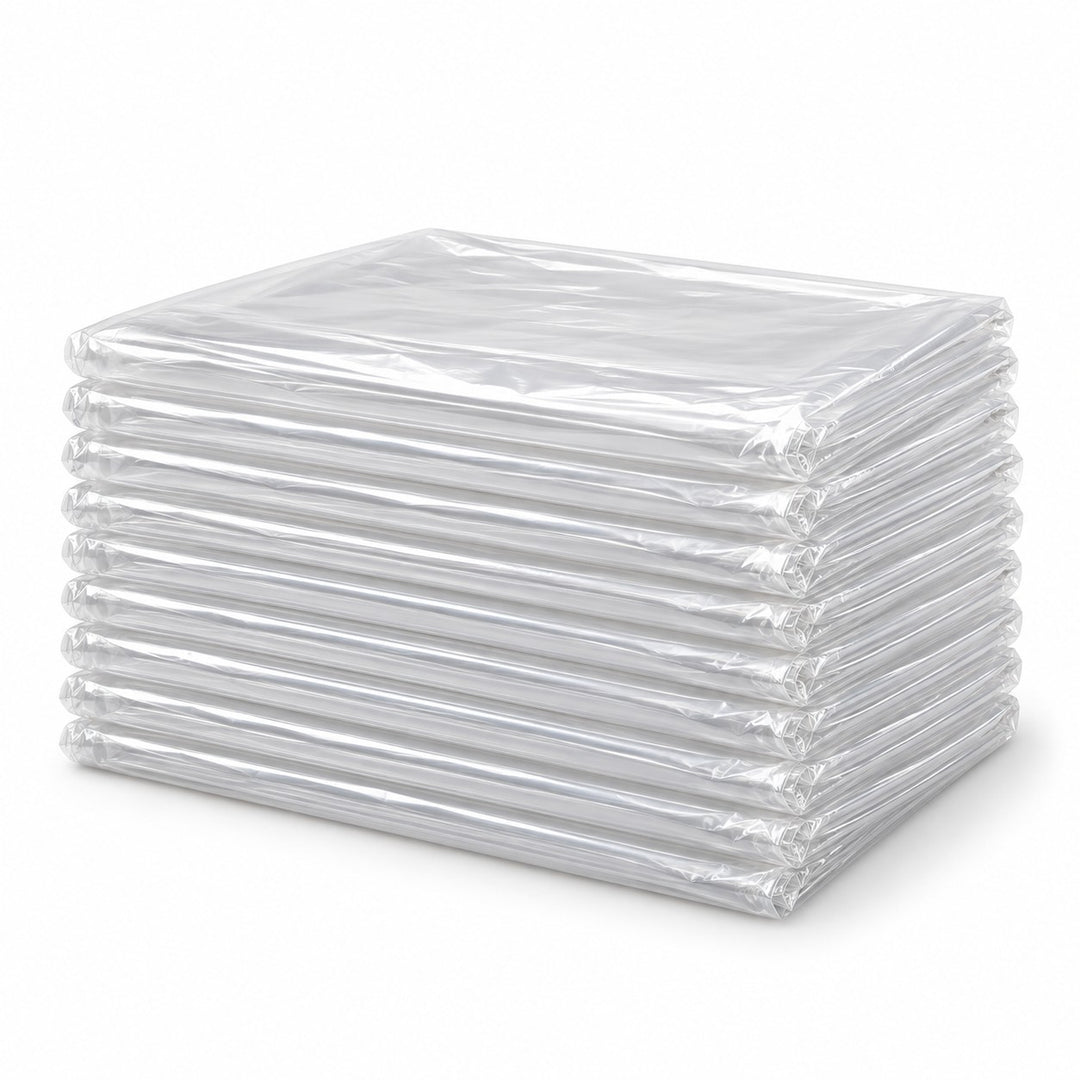 A neat stack of ten clear disposable plastic tablecloths shows the single-use covers included.