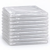 Set of 10 clear disposable plastic tablecloths folded in a compact stack on a pale backdrop.