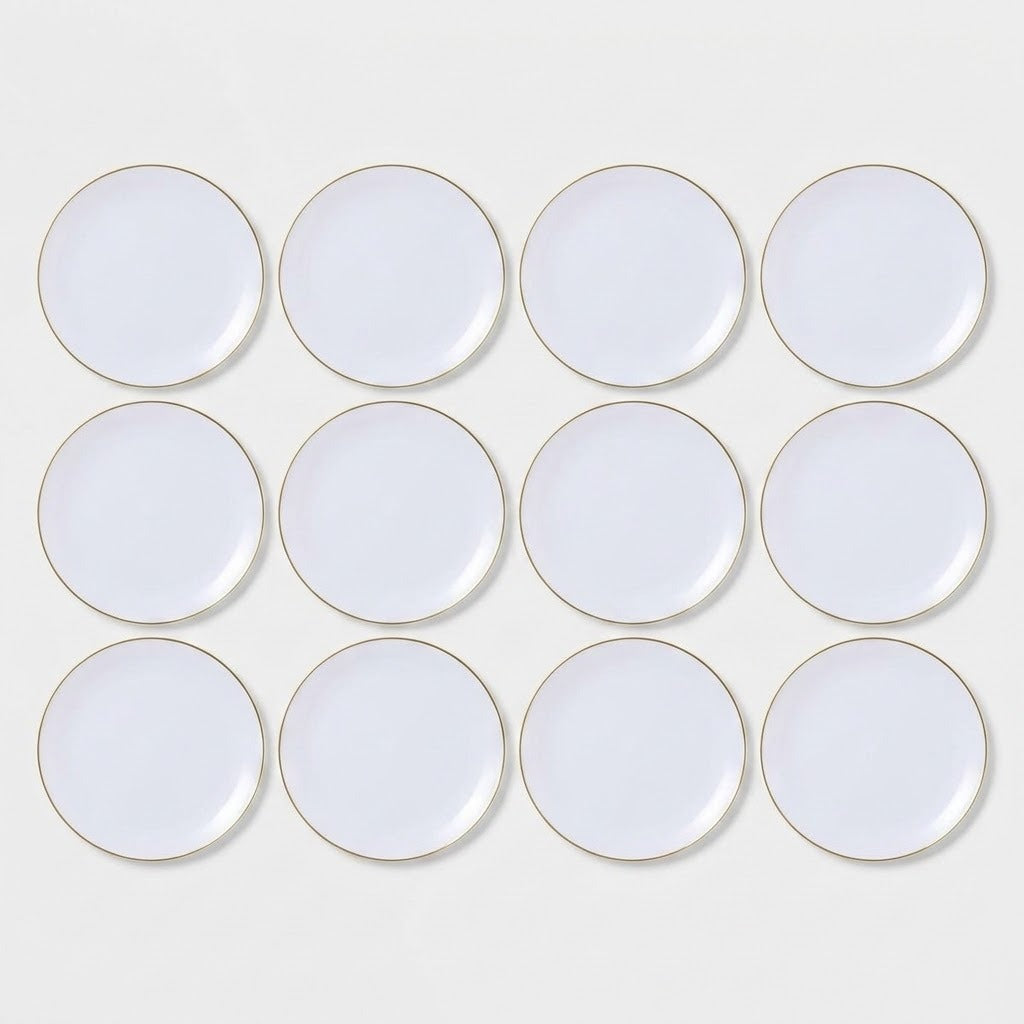 A set of twelve white round plates with a delicate gold rim, arranged in a neat 3x4 grid on a light gray background.