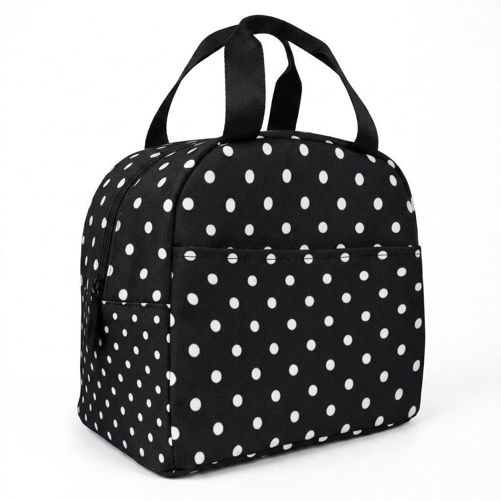 A black insulated lunch bag with a white polka dot pattern, featuring two top handles and a front zippered pocket, shown on a plain white background.
