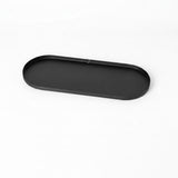 Glass shelf with metal brackets on a white background