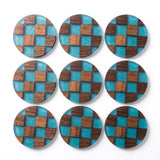 Nine round coasters arranged in a 3x3 grid on a white background, each featuring a checkered pattern of turquoise blue and dark brown wood.