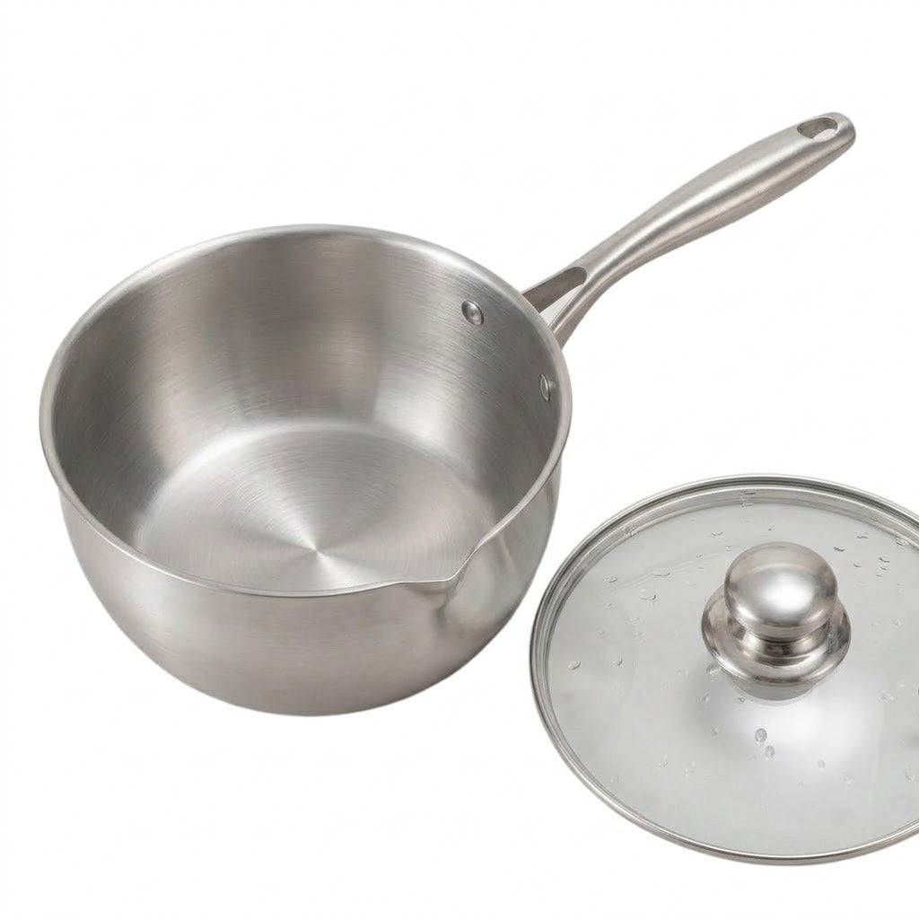 A stainless steel saucepan with a matching glass lid, shown on a clean white background.