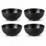 Exactly four black Japanese-style bowls sit in a two-by-two arrangement on white.