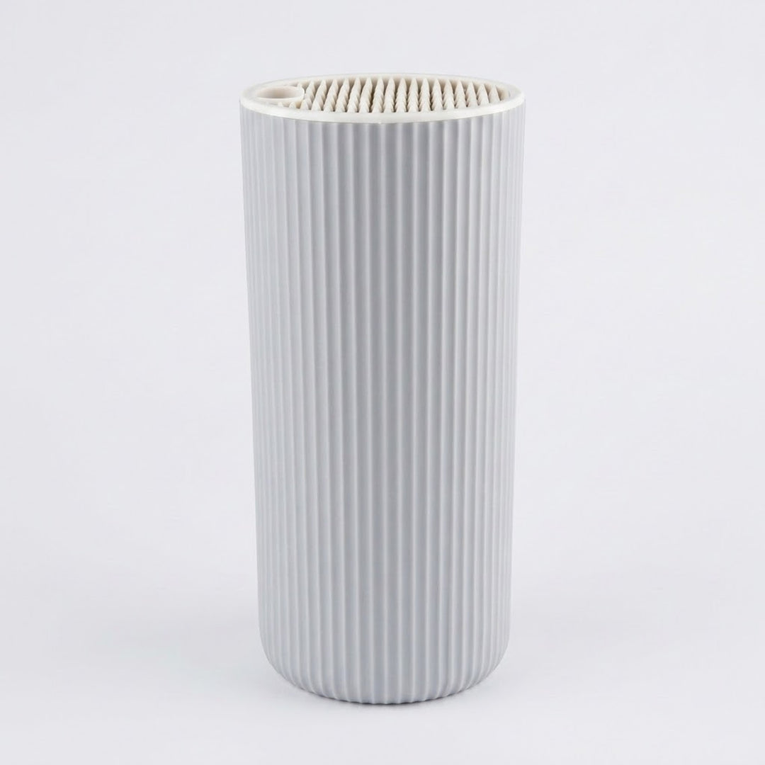 A light gray pleated cylindrical filter cartridge, likely for a humidifier or air purifier, shown against a plain white background.