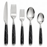Five-piece black and silver flatware set showing one knife, two forks and two spoons on white.