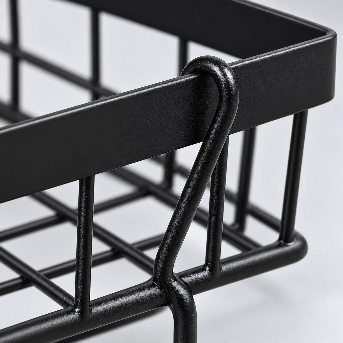 Black Two-Tier Produce Basket close-up shows its coated metal rim and wire construction.