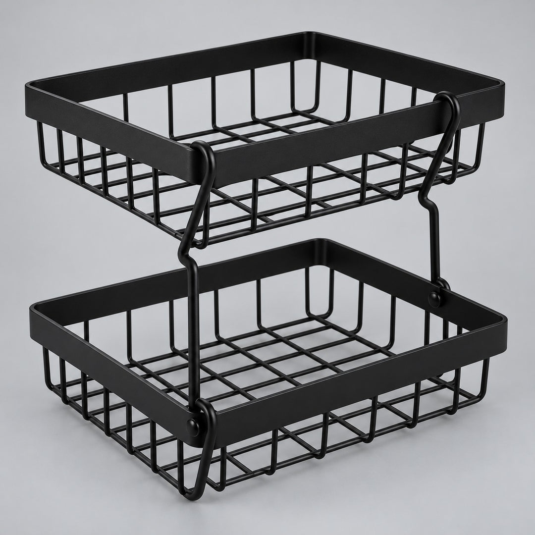 Black Two-Tier Produce Basket stands assembled against a soft gray studio backdrop.