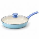 Ceramic Glaze Nonstick Frying Pan with its glass lid and blue knob on a white studio background.