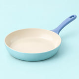 Ceramic Glaze Nonstick Frying Pan, pan only, centered on a pale aqua studio background.
