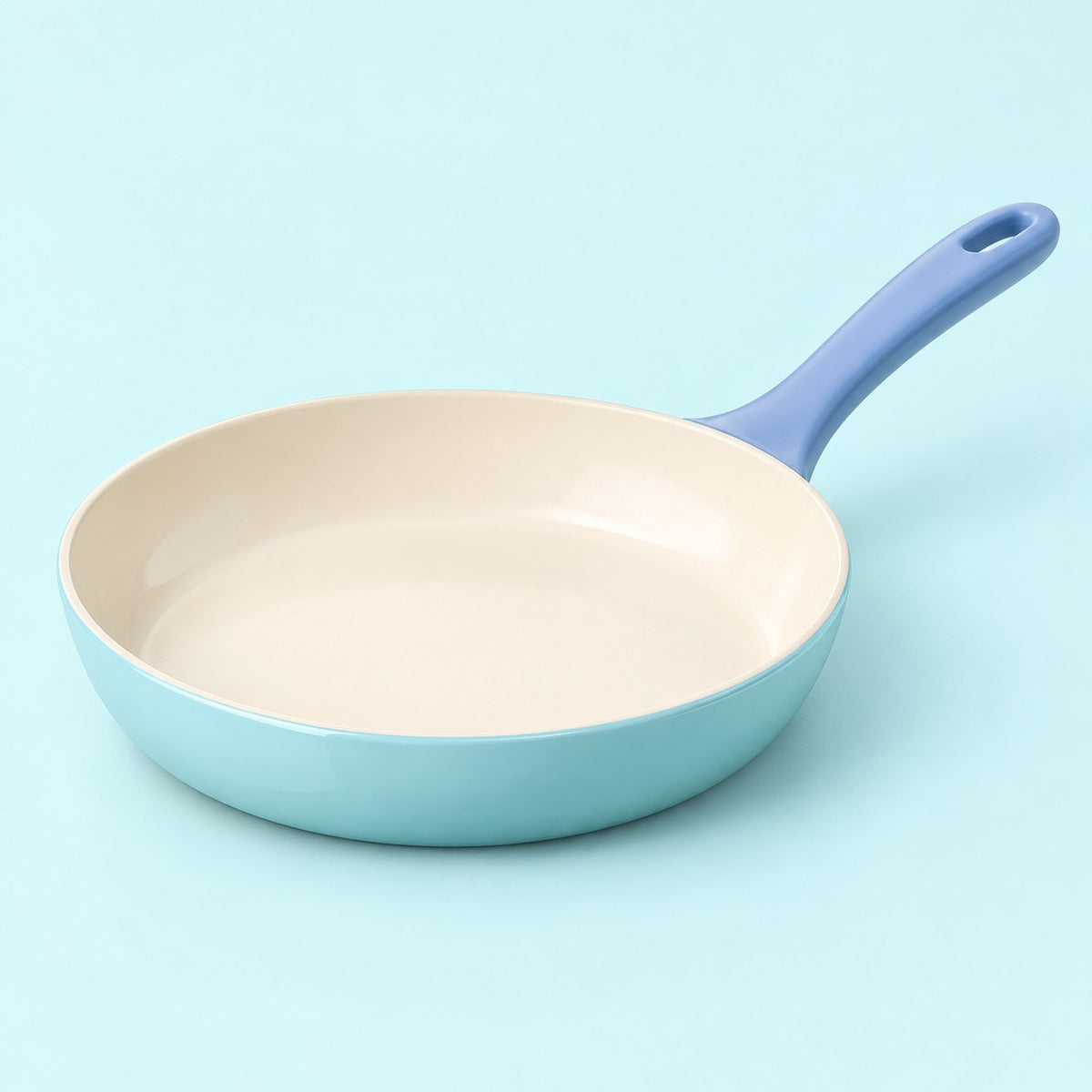 Ceramic Glaze Nonstick Frying Pan, pan only, centered on a pale aqua studio background.