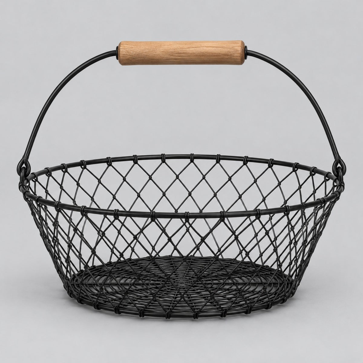 Black Wire Basket with Wooden Grip shown alone against a soft gray studio backdrop.
