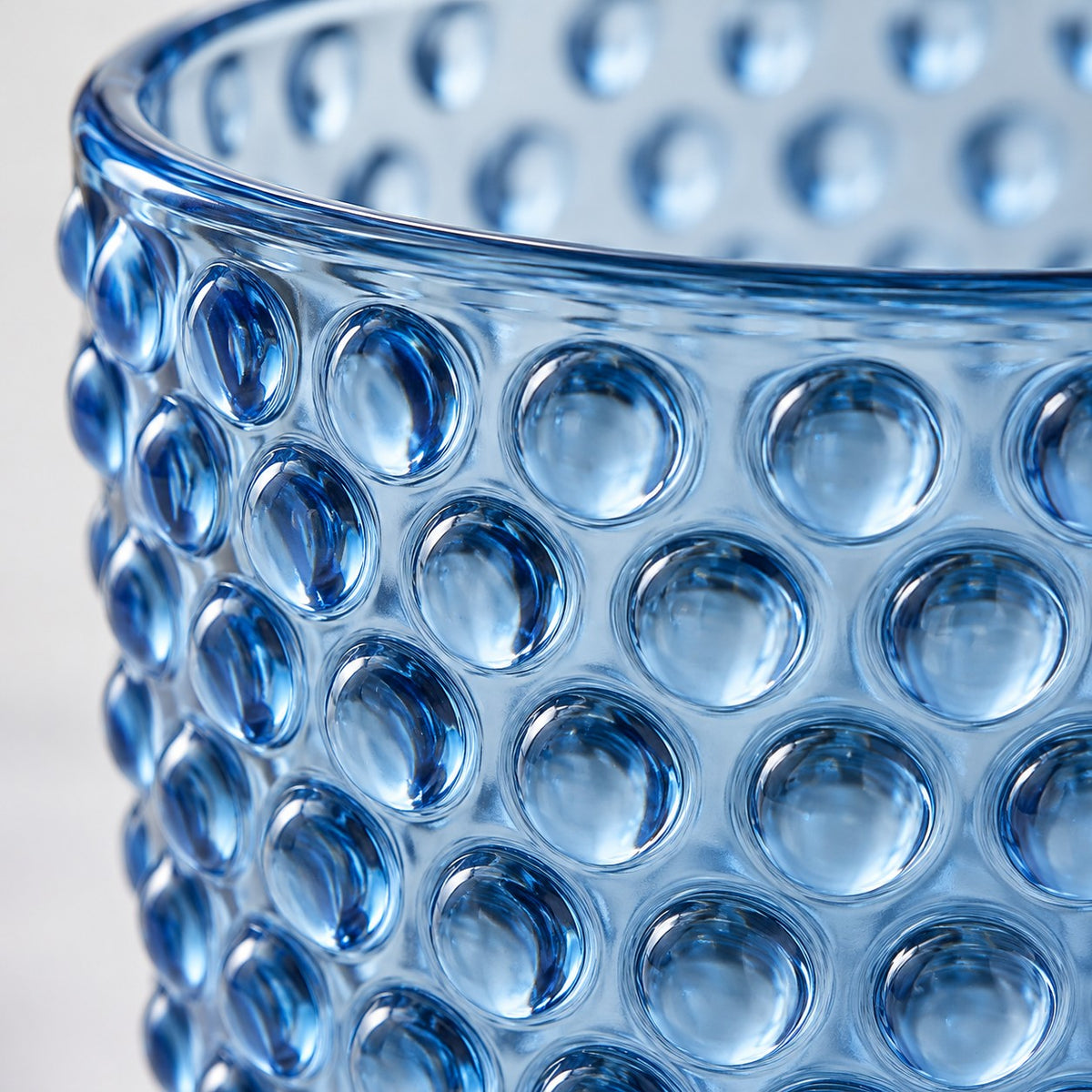 Blue Vintage Hobnail Drinking Glass shows its glossy glass finish and raised circular hobnail texture.