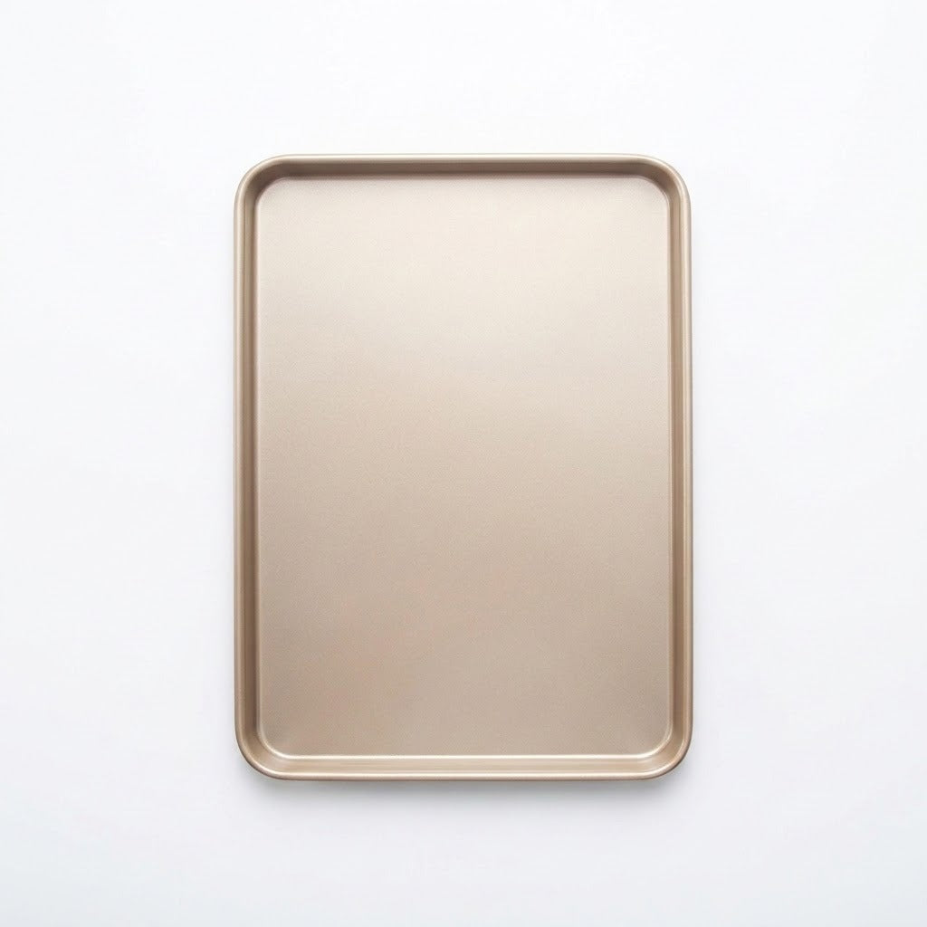 A rectangular metal baking sheet with rounded corners, shown from a top-down view on a clean white background.