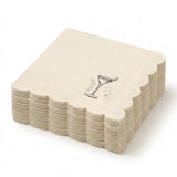 A stack of square paper napkins with scalloped edges, shown on a clean white background. The napkins are a light cream color with a small black printed cocktail glass graphic and the words 'Beverage' on the top napkin.