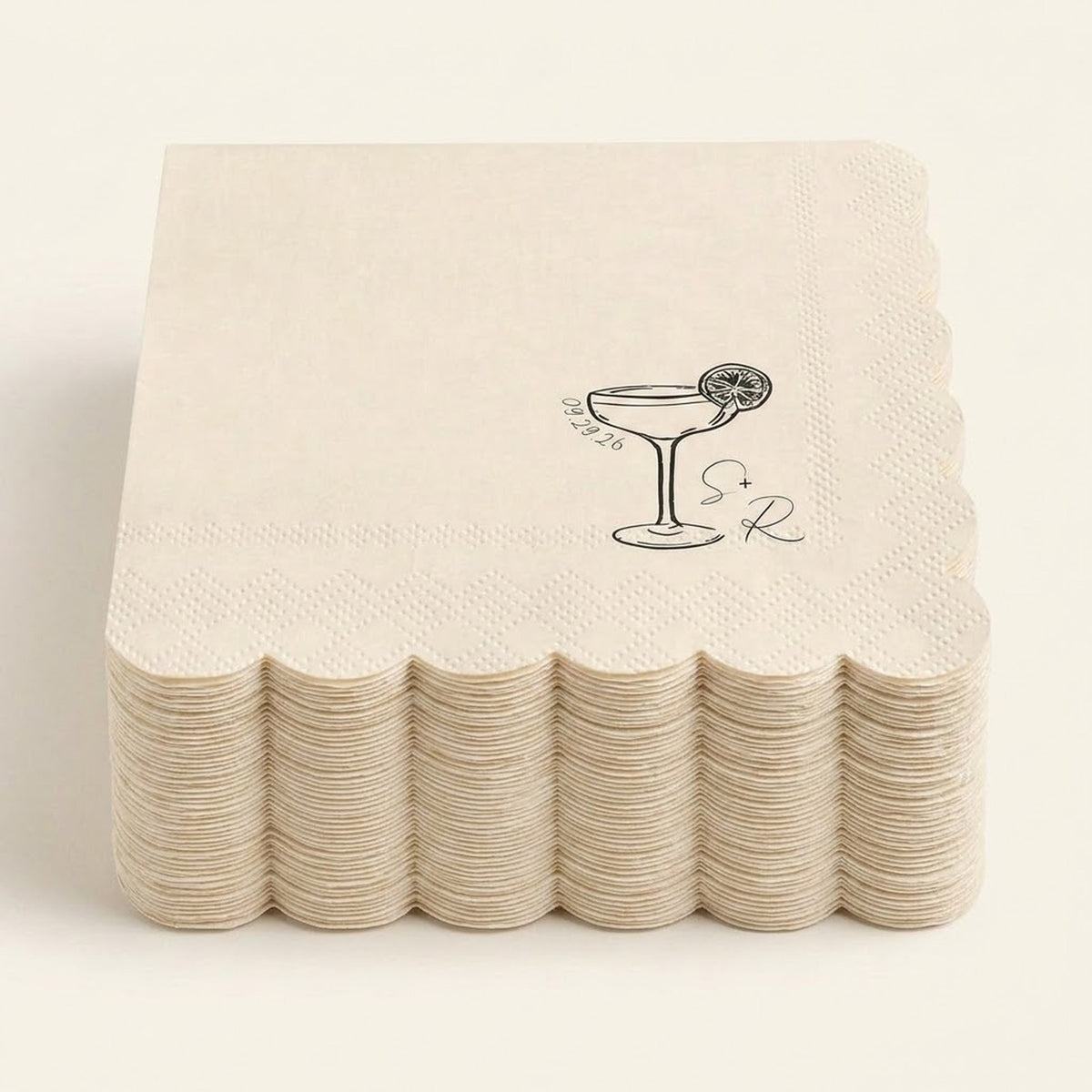A stack of square off-white paper napkins with scalloped edges, each printed with a black cocktail glass illustration and the words 'Oscar the 2nd' on a light cream background.