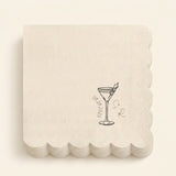 A stack of square off-white paper napkins with scalloped edges, each printed with a small black cocktail glass illustration, the date '09.09.