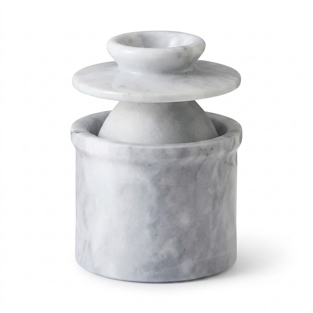 A small white marble candelabra with a cylindrical base, a flared middle section, and a top cup, shown on a plain white background.