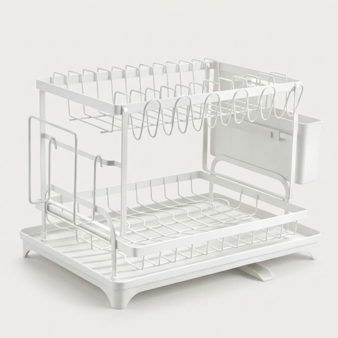 A white two-tier metal dish rack with a sink-mounted cup holder and hanging utensil hooks, shown on a light gray background.