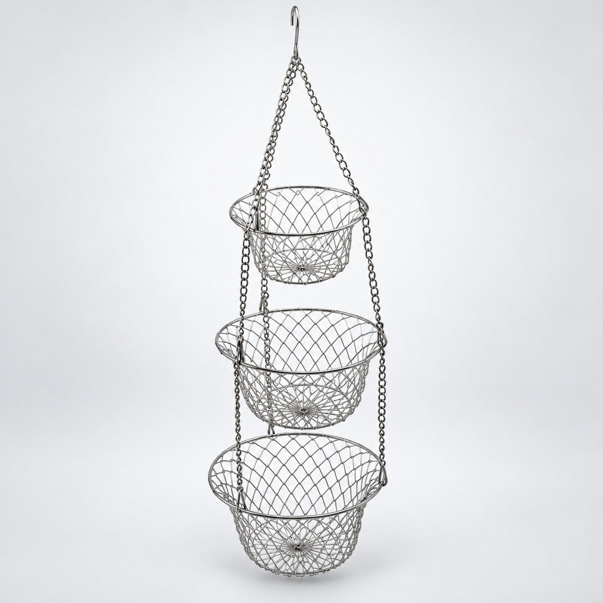 Silver Three Tier Hanging Fruit Basket hangs assembled against a pale gray studio background.