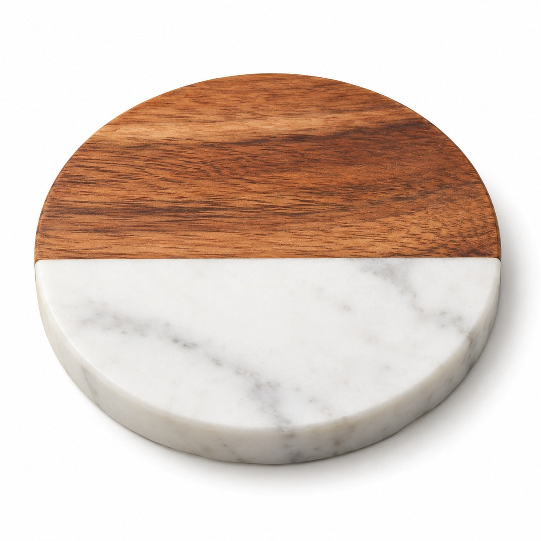 One round acacia wood and white marble coaster shown alone on a white background.