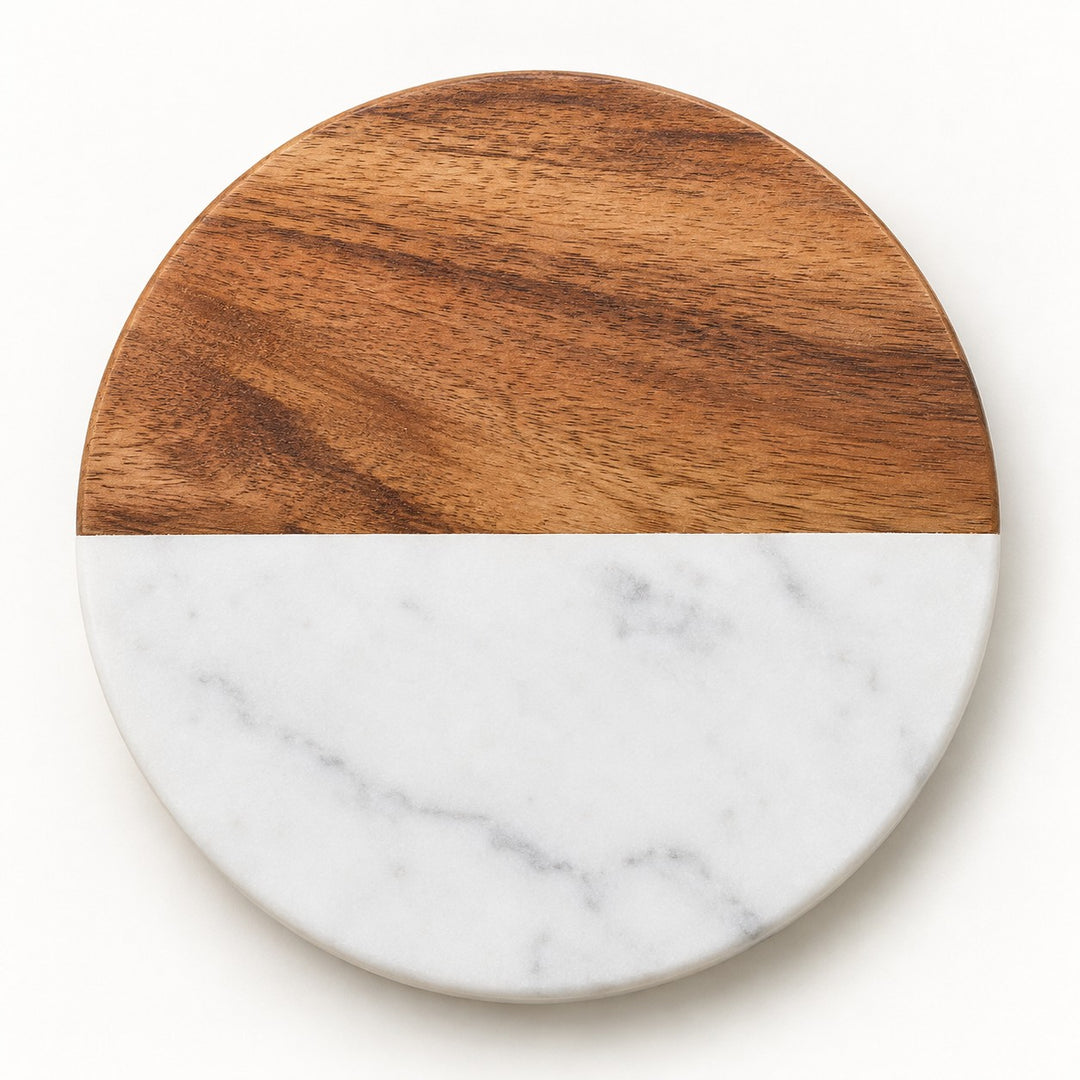 White Round coaster combines natural acacia wood and pale veined marble on a soft white backdrop.