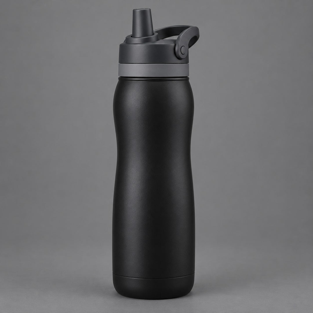 Black 24 oz insulated straw bottle centered against a soft charcoal studio background.