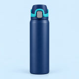 Blue 24 oz insulated straw bottle with turquoise accents against a pale blue background.