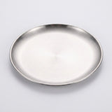 A round brushed stainless steel tray or shallow plate with a polished rim, shown from a top-down perspective on a light gray background.