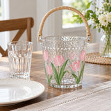 Tulip glass ice bucket beside a drinking glass and plate shows its tabletop scale.