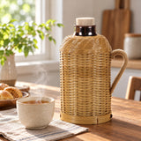 Bamboo Glass-Lined Thermos ready beside a tea cup on a sunlit breakfast table.