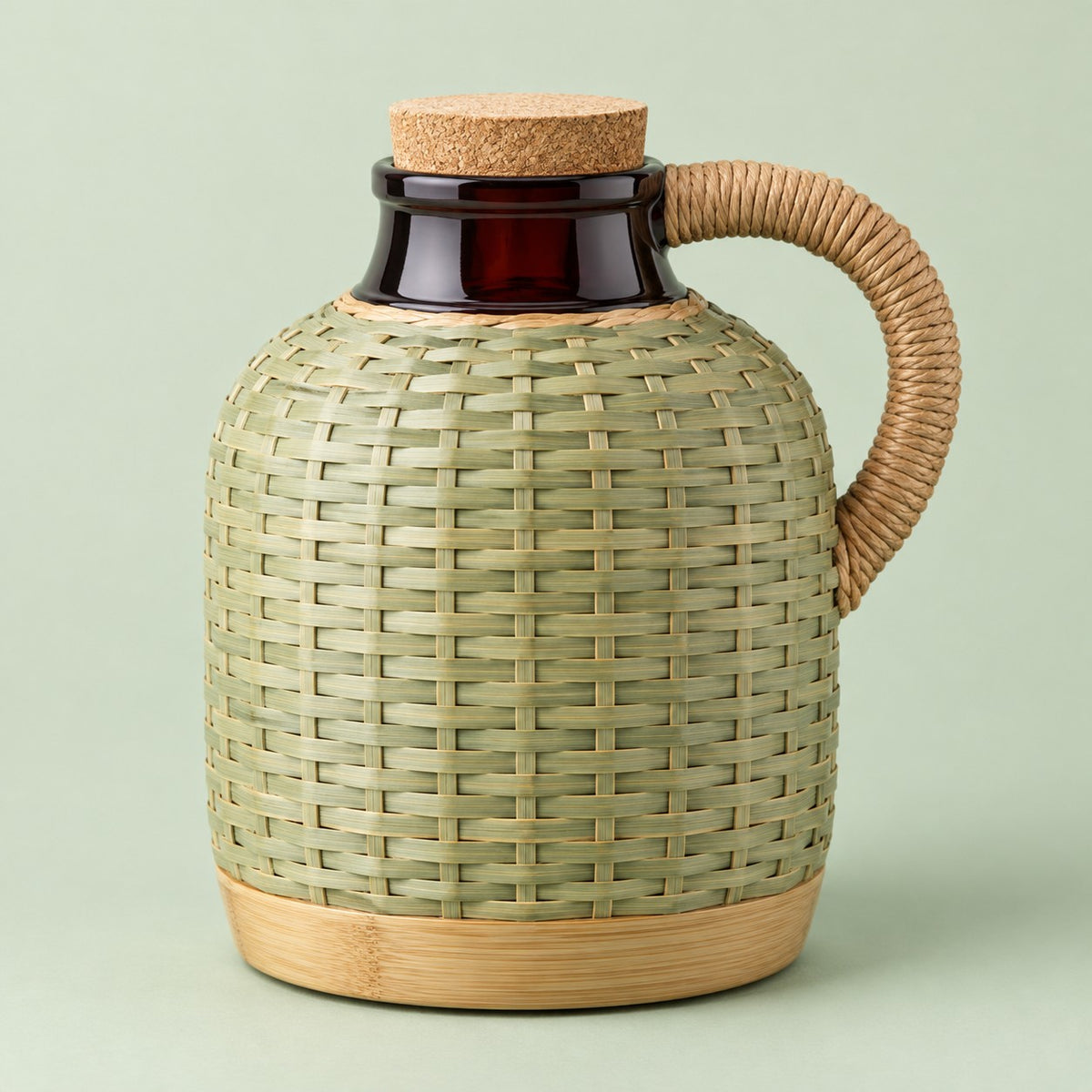 Green Weave, Red Liner thermos shown with its rounded body and rope-wrapped handle.