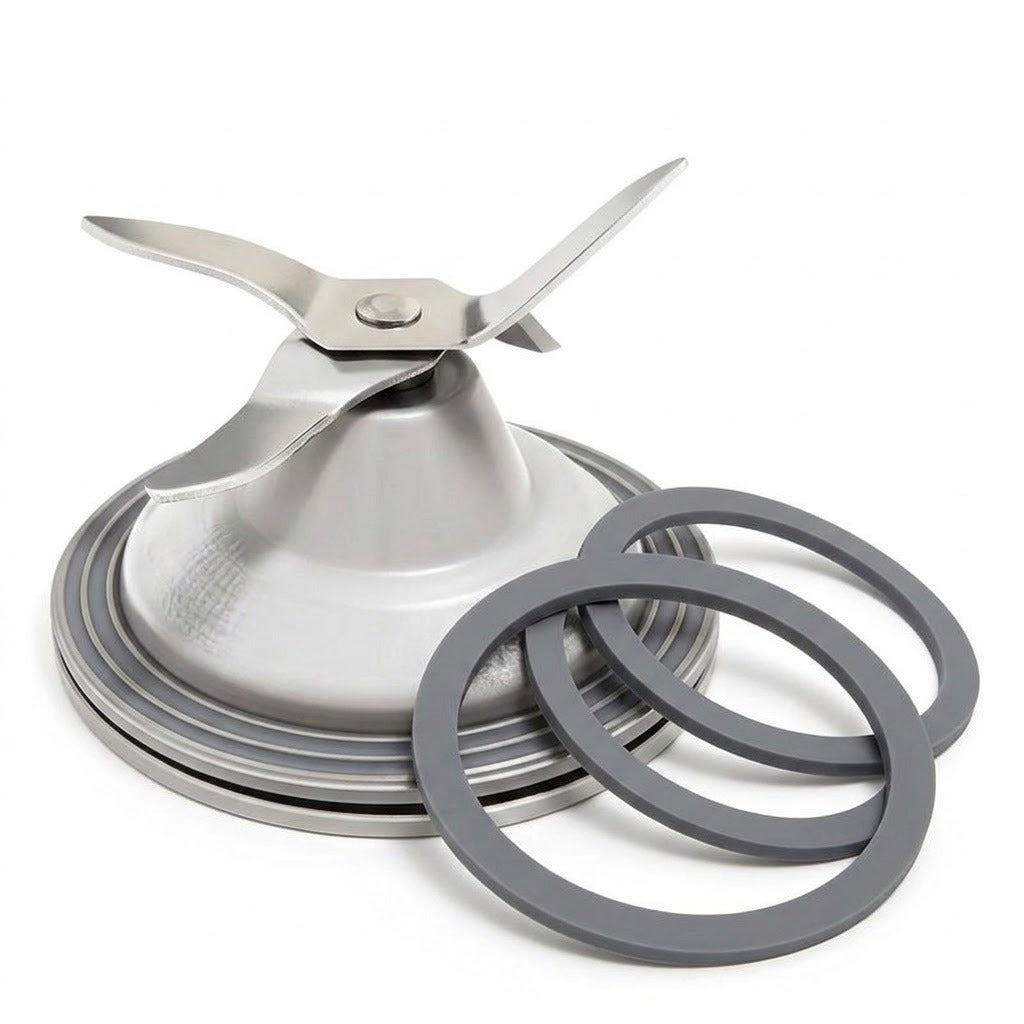 A stainless steel blender blade assembly with a three-blade impeller and three dark gray rubber seals, shown on a clean white background.