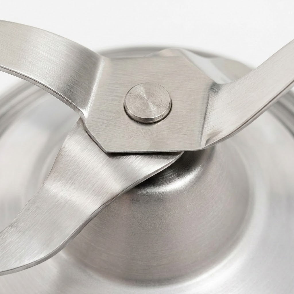 Close-up of a brushed stainless steel kitchen utensil or container lid component with a central hexagonal fastener and curved metal arms on a white background.